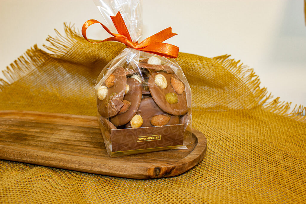 Azza milk chocolate with almonds, hazelnuts and raisins – Azza